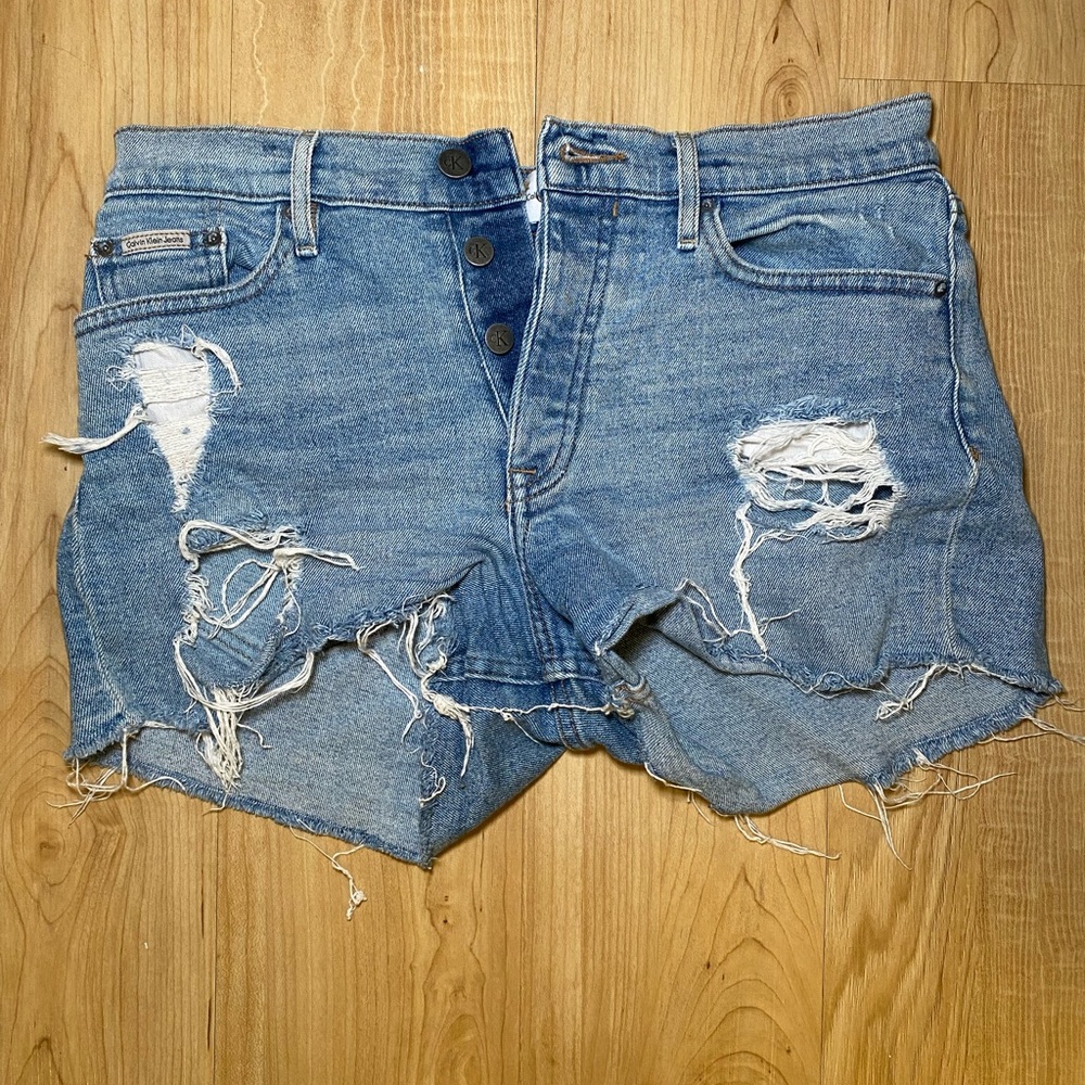 Calvin Klein mini mid-rise ripped jean shorts